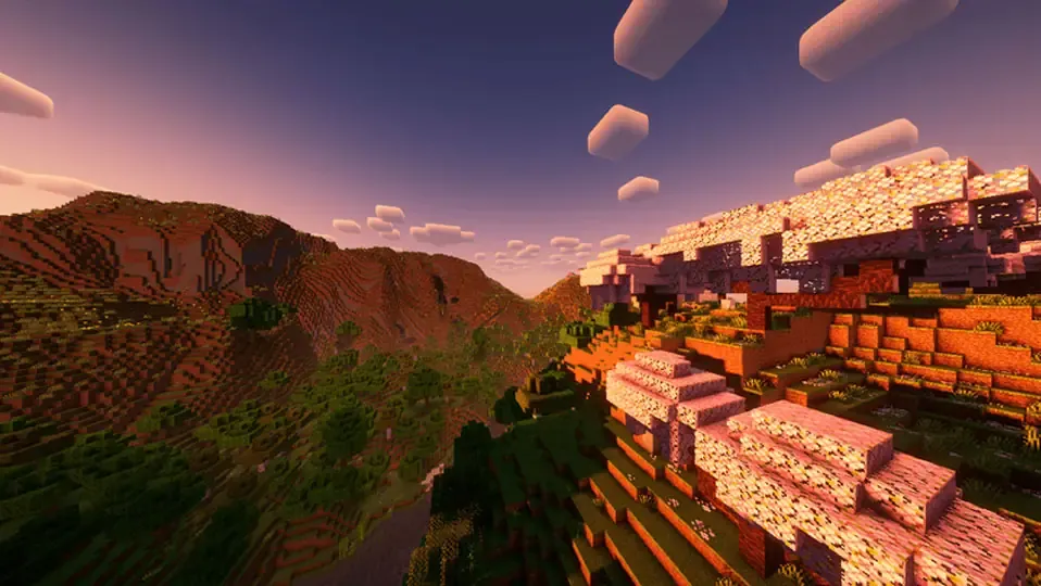 Mundo de minecraft con una montaña y al lado de un bioma de cherry blossom