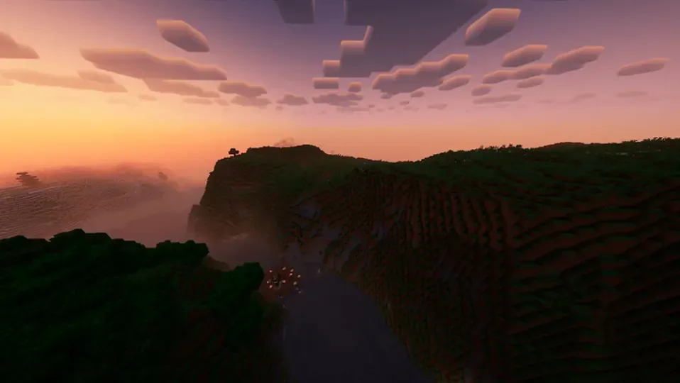 Mundo de minecraft con un rio en el centro y con dos montañas enormes a los lados