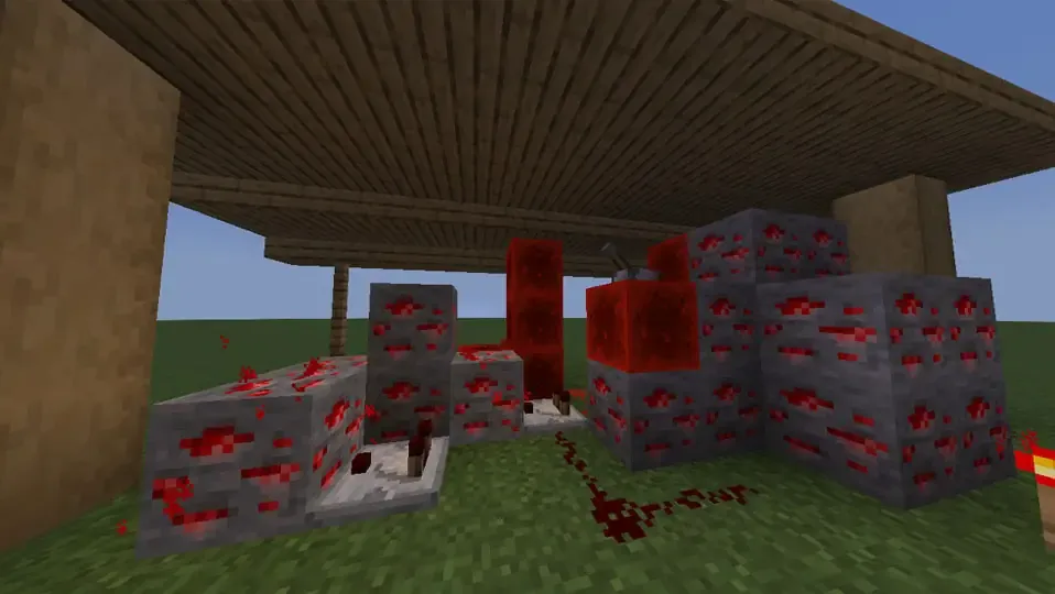 Mundo plano con varios bloqqques de redstone y con componentes de redstone