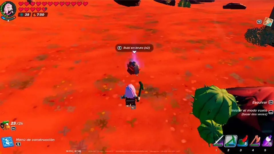 Captura de pantalla de Fortnite Lego con el item de rubi en el suelo