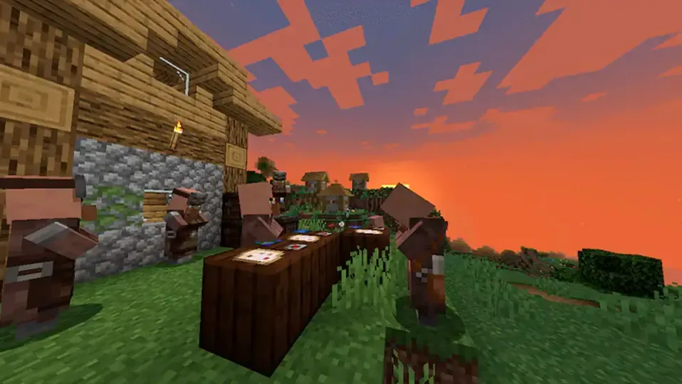 Captura de pantalla de Minecraft con varios aldeanos cartografos y un fondo de un pueblo